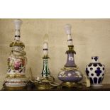 Three Victorian opaline overlaid glass vases converted into table lamps; together with a further