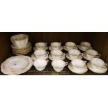 Foley China part tea service comprising teacups, saucers, plates, bowls etc, all of wavy form with