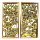 Pair of Chinese carved rectangular panels, decorated with birds amidst foliage, 36" high x 17..5"