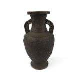 Japanese bronze twin handled baluster vase embossed with scrolled foliage and diaper borders, 18.