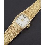 Omega 9ct lady's bracelet watch, circa 1972, the silvered dial with baton markers, cal. 485 17 jewel