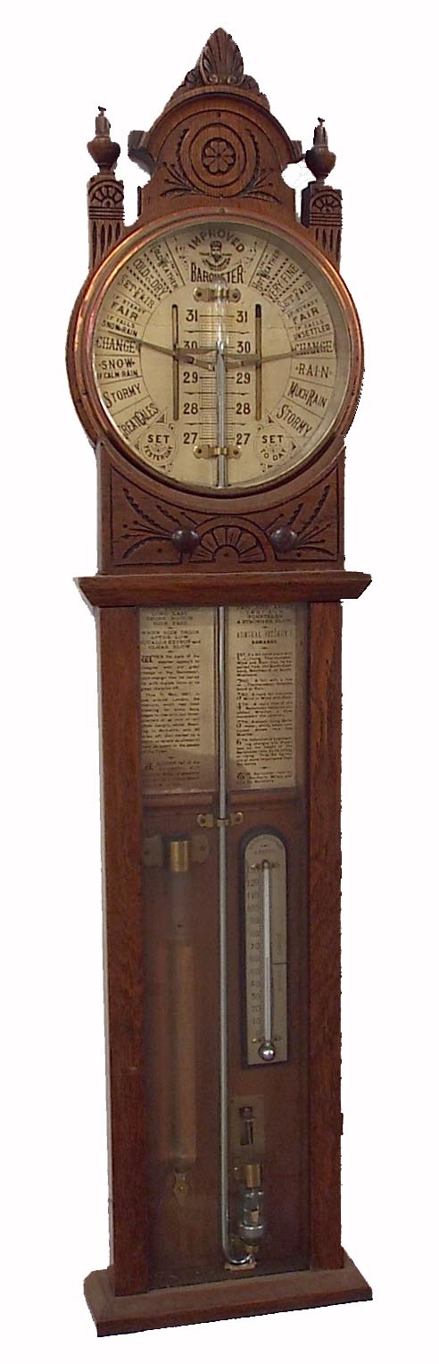 Admiral Fitzroy oak cased barometer, inset with a Shoolbred & Co thermometer, the 8" circular dial