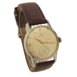 Omega stainless steel gentleman's wristwatch, circa 1964, the silvered dial with Arabic quarter