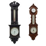 Negretti & Zambra ebonised carved oak wall barometer/thermometer, within an architectural case,