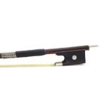 Silver mounted violin bow, unstamped, the stick round, the ebony frog inlaid with pearl eyes and