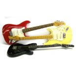 Two Shine Stratocaster style electric guitars, both appear to be in working order; together with