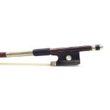 Silver mounted violin bow, faintly stamped, the stick round, the ebony frog inlaid with large