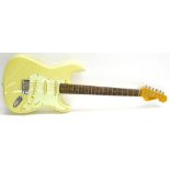 Jim Deacon Stratocaster style electric guitar, white finish with some minor wear, electrics appear