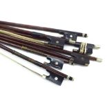 Six various violin bows, also a bow stick (7)