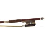 Silver mounted violoncello bow stamped Vtor Fetique a Paris, the stick octagonal, the bone frog