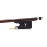 French silver mounted violin bow by and stamped C. Thomassin a Paris, the stick round, the ebony