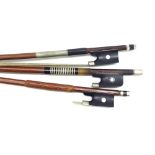Silver mounted violin bow stamped Charles Brugere, 59gm; also two nickel mounted violin bows stamped