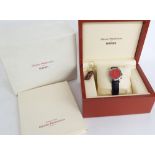 Girard-Perregaux Ferrari 'Modena Red' chronograph stainless steel gentleman's wristwatch, ref. 8020,