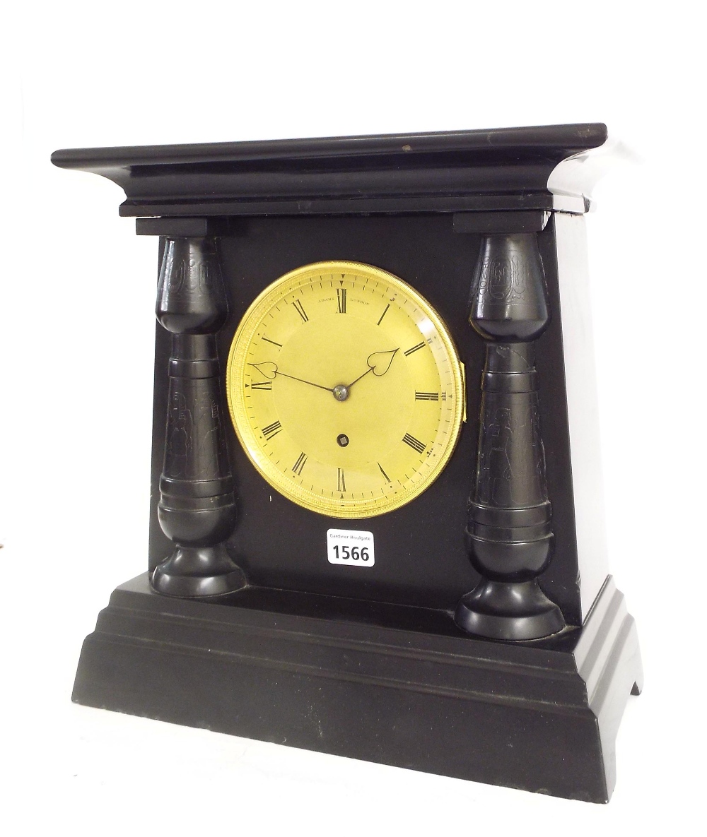 Large Egyptian style black marble single fusee mantel clock, the 5.5" gilt dial signed Adams, London