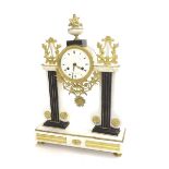 French Empire white metal and ormolu mounted two train pillar mantel clock, the movement with
