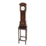 Attractive mahogany and satinwood inlaid two train miniature longcase clock striking on a gong,