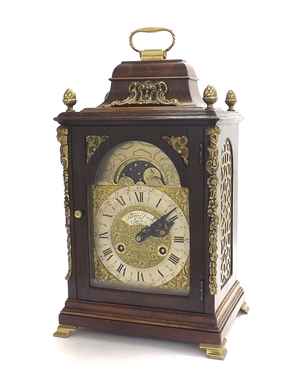 Contemporary walnut two train bracket clock, the movement striking on two bells, the 6" brass arched