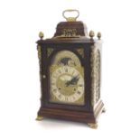 Contemporary walnut two train bracket clock, the movement striking on two bells, the 6" brass arched