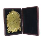 Ormolu strut clock in the manner of Thomas Cole, the foliate engraved oval brass dial with