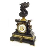 Impressive black marble two train mantel clock striking on a bell, the 4" chapter ring enclosing a