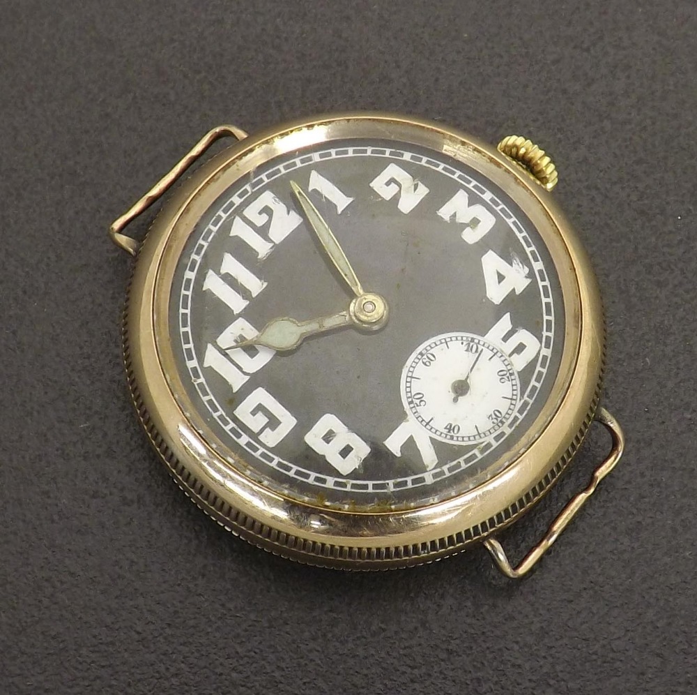 Rolex 9ct Military officer's trench wristwatch, import hallmarks for London 1915, the black dial