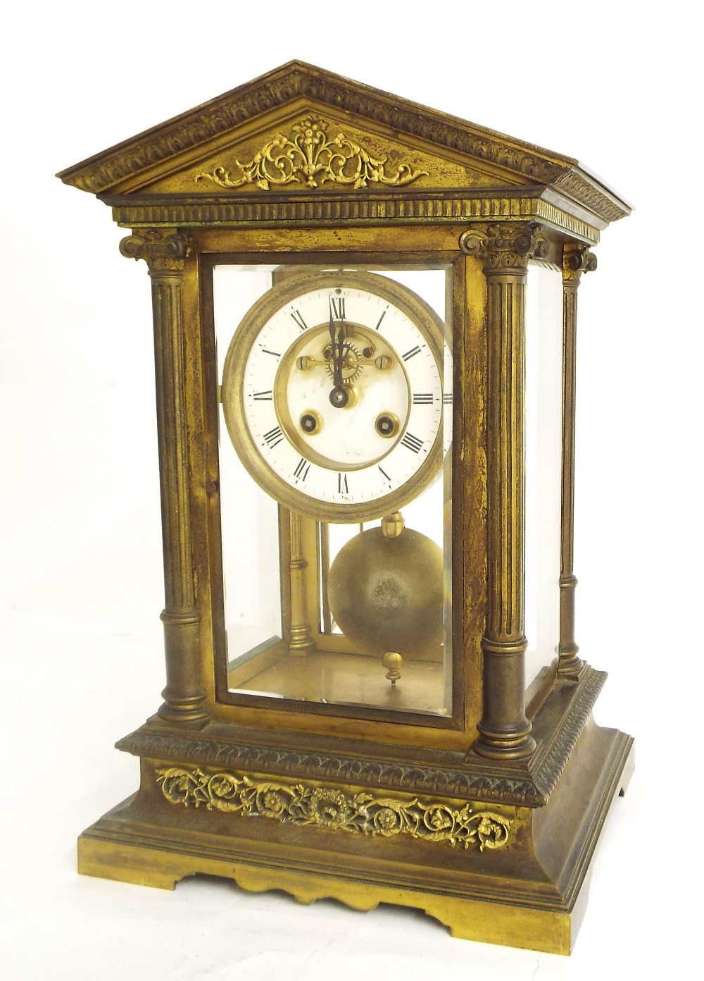 Impressive bronze four glass two train mantel clock striking on a bell, the 4" dial with recessed