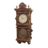 Arts & Crafts oak two train wall clock with Lenzkirch movement, the 6.25" silvered dial within an