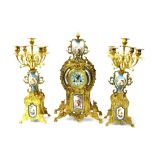 French bronzed two train ornate mantel clock garniture striking on a bell, the 4" dial with Roman