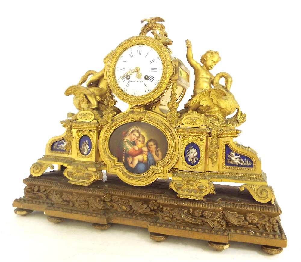 French gilt metal and porcelain panelled two train mantel clock striking on a bell, the 4"