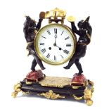 Decorative novelty two train mantel clock, the 5" white dial within a musical drum casing attended