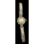 Omega 14k diamond set lady's wristwatch, small circular dial with baton markers within a diamond
