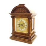 German walnut ting-tang mantel clock striking on two gongs, the 7" square brass dial with silver