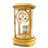 French eight day oval four glass mantel clock, the 4" two part white dial with visible Brocot