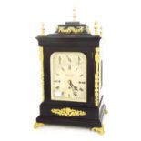English ebonised triple fusee bracket clock, the pull/repeat movement striking on a large gong and
