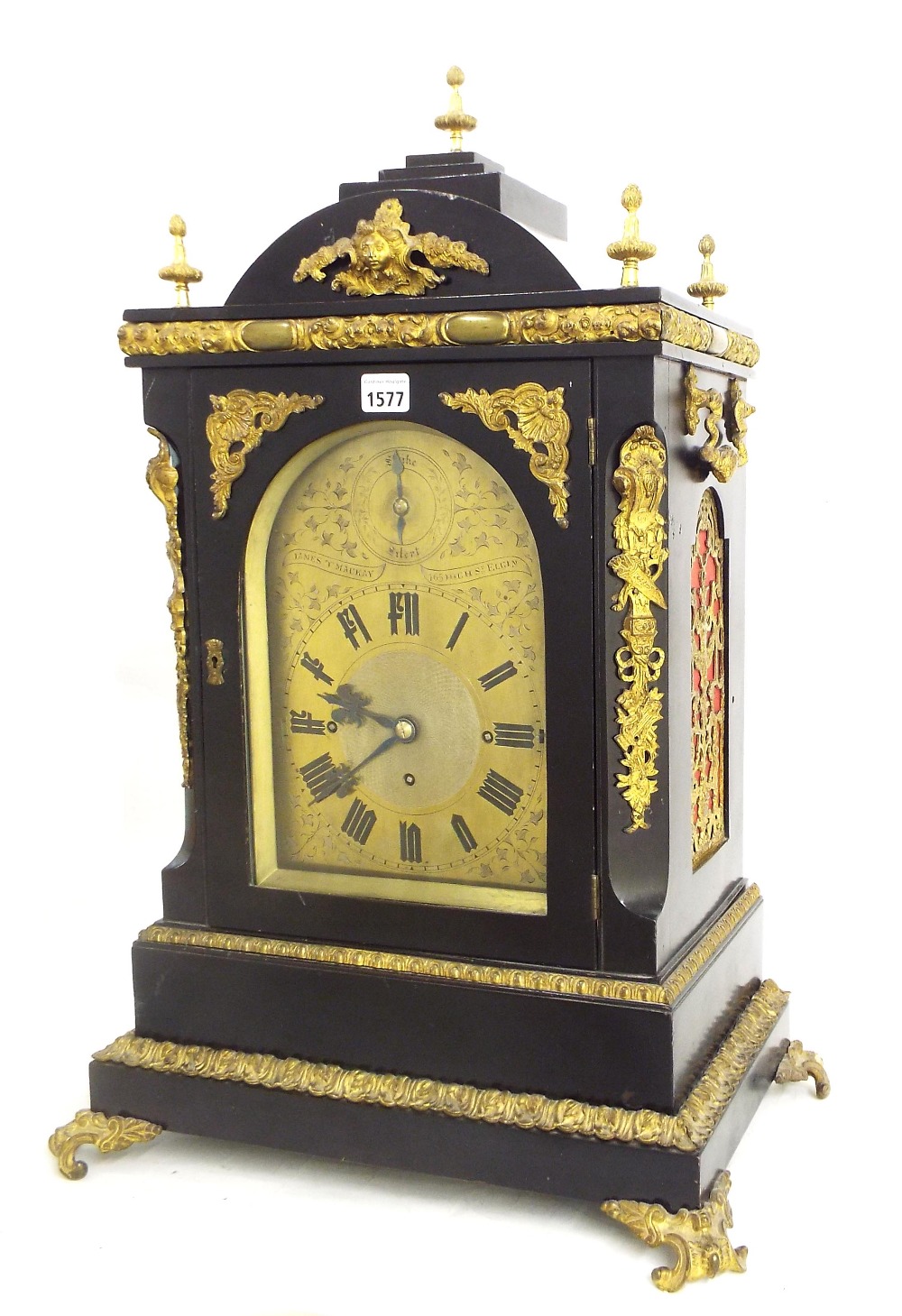 English ebonised boardroom triple fusee mantel clock, the substantial movement playing on a nest