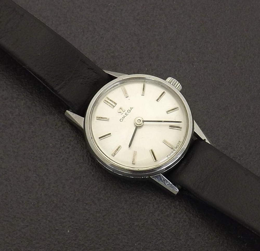 Omega stainless steel lady's wristwatch, circa 1964, circular silvered dial with baton markers, cal.