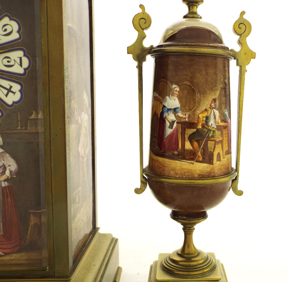 Brass and porcelain panelled two train mantel clock garniture striking on a gong, the front and side - Image 2 of 4