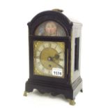 Small ebonised single fusee bracket clock, the 4" square brass dial within a rounded arched