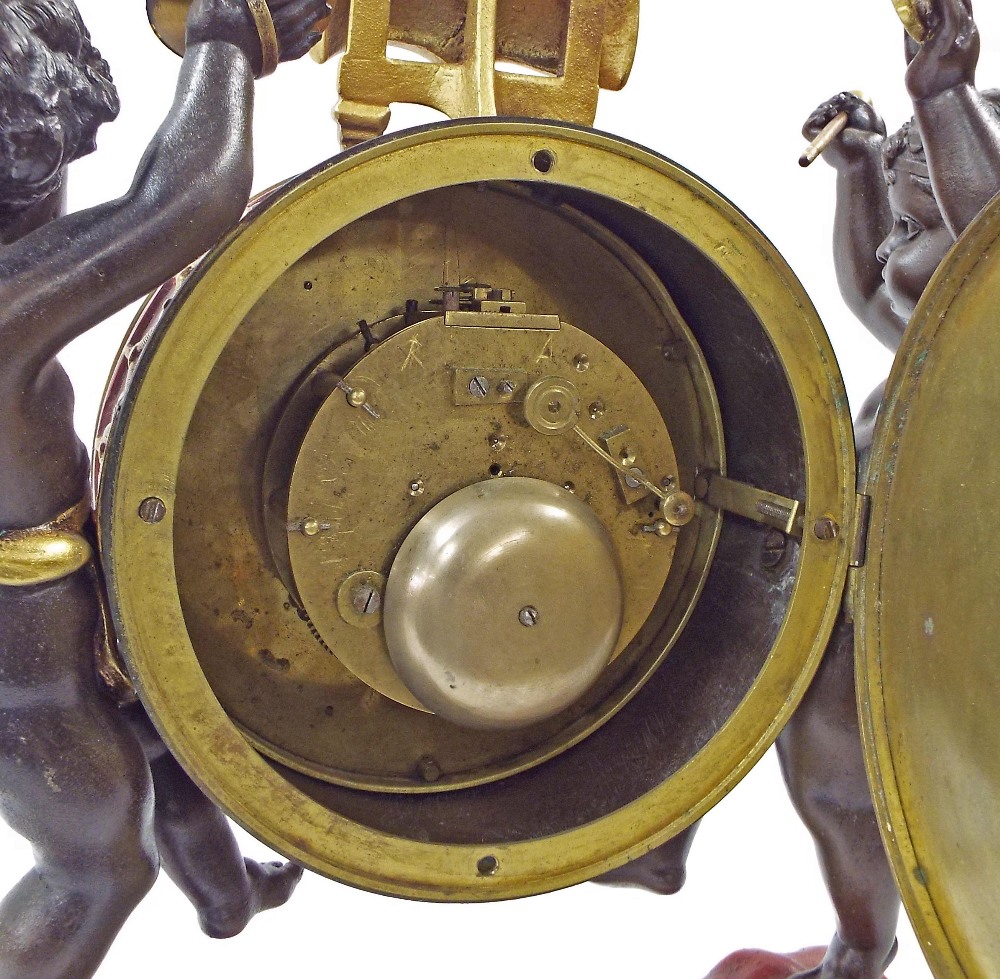 Decorative novelty two train mantel clock, the 5" white dial within a musical drum casing attended - Image 3 of 3