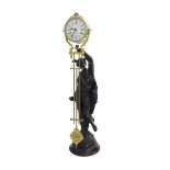 Spelter figural swinging mystery clock, the 3.75" dial signed Dubuc a Paris, within a drumhead