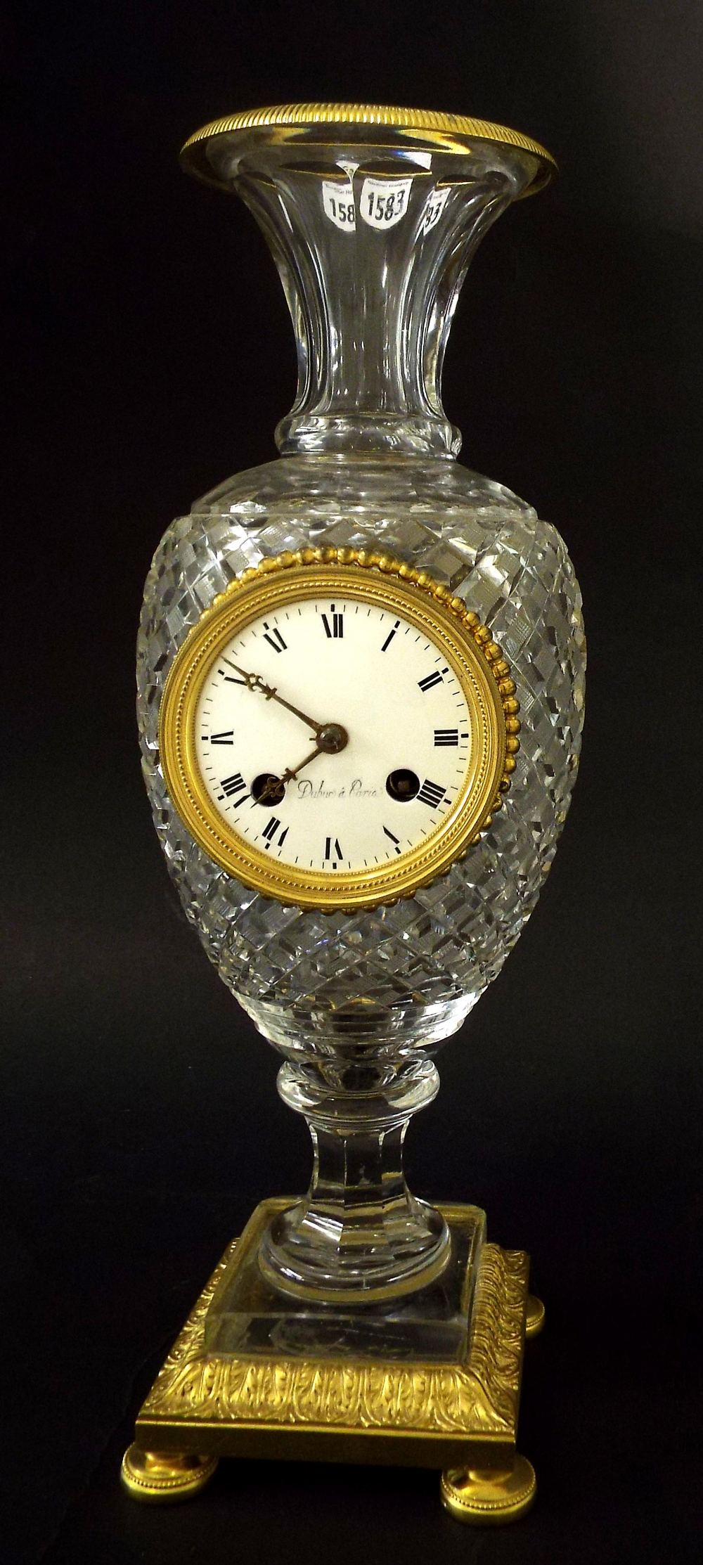 French Baccarat type glass two train vase mantel clock striking on a bell, the 2.75" dial signed