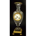 French Baccarat type glass two train vase mantel clock striking on a bell, the 2.75" dial signed