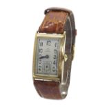 Omega 1930s 9ct rectangular curved gentleman's wristwatch, the engine turned silvered dial with