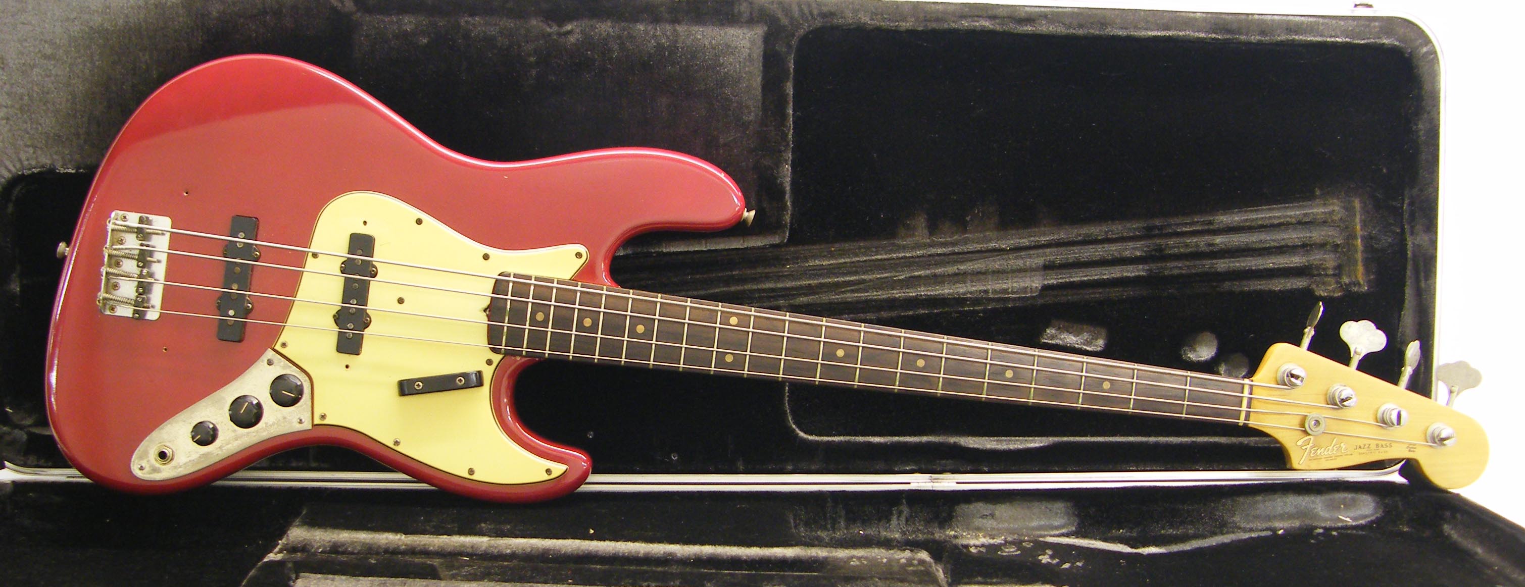 1964 Fender Jazz Bass electric bass guitar, made in USA, ser. no. L21548, red re-finish with various