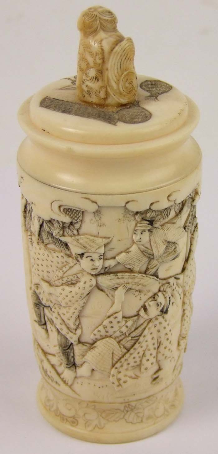 A Japanese carved ivory cylindrical box, the cover with monkey finial, and carved all round with - Image 2 of 3