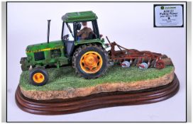 John Deere Border Fine Arts Tractor Model mounted on wooden plaque. Named: Pulling Power, model