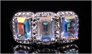 Mercury Mystic Topaz Trilogy Ring, three octagon cuts, totalling 3.25cts, of the bright polychrome