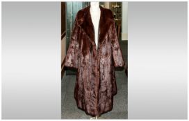 Ladies Three Quarter Length Red Squirrel Coat, fully lined. Collar with revers. Hook & Loop