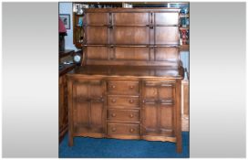 Ercol Cottage Welsh Dresser, in a honey colour. With a rack.