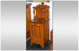 Art Nouveau Oak Standing Fall Down Front Coal Scuttle, with a shaped top shelf with turned side